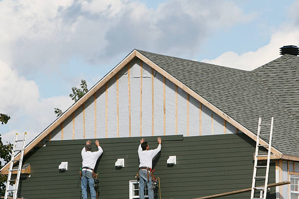 Professional Siding Installation technician working in Fletcher, OH